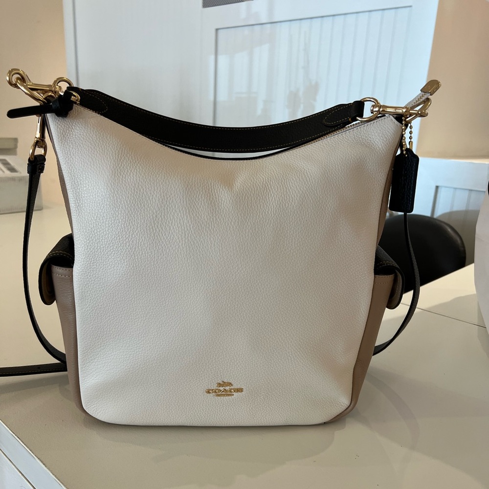 NWOT leather Coach Pennie Shoulder Bag in tan, cream, and gray color block